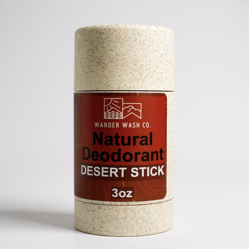 Load image into Gallery viewer, Wander Wash Co. Desert Stick natural deodorant in a speckled wheat straw tube with a rust-red label, 3 oz

