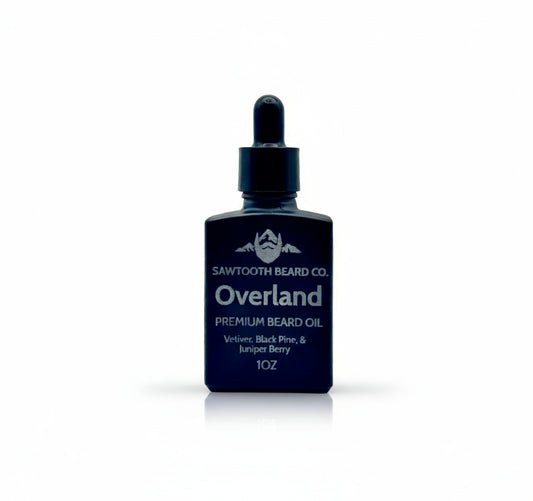Sawtooth Beard Co. Overland premium beard oil bottle on a gray background