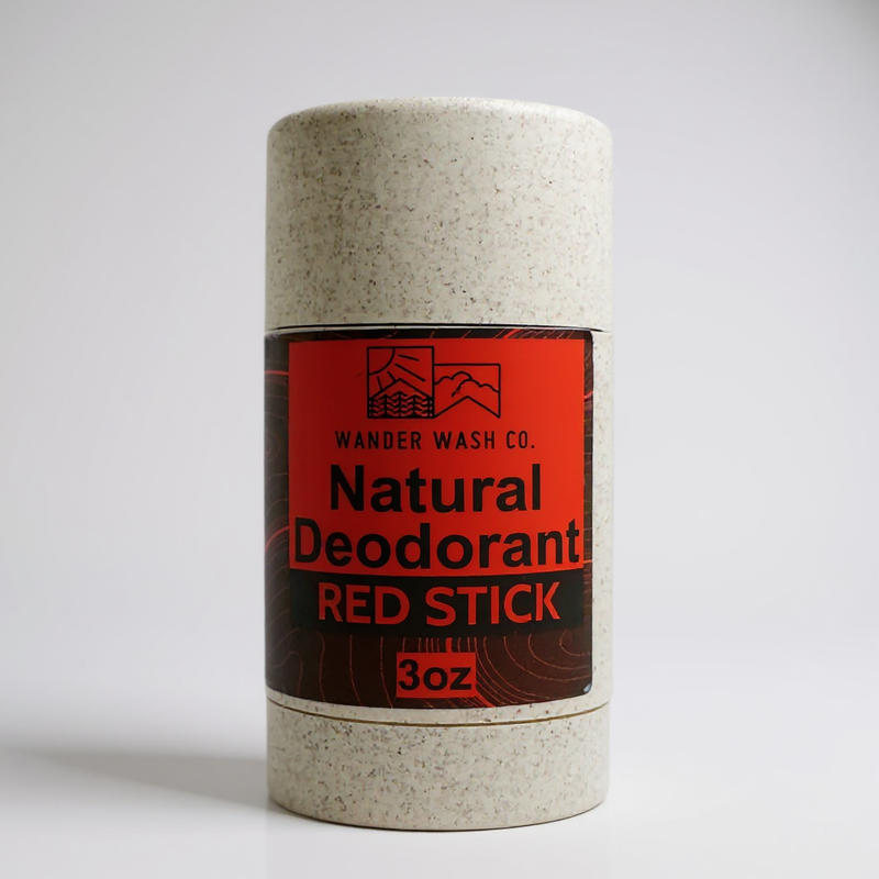 Load image into Gallery viewer, Wander Wash Co. Red Stick natural deodorant in a speckled wheat straw tube with a red and black label, 3 oz

