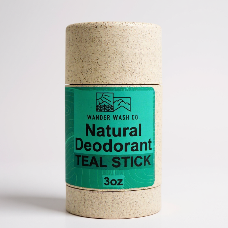 Load image into Gallery viewer, Wander Wash Co. Teal Stick natural deodorant in a speckled wheat straw tube with a teal label, 3 oz

